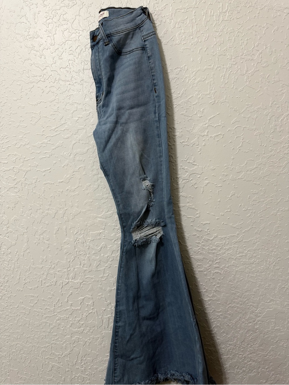 Vibrant Light Blue Distressed Bell Bottom Jeans
